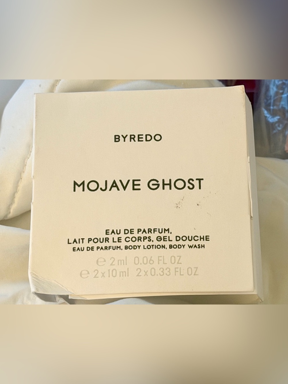 Byredo Mojave Ghost Body Lotion Sample - Cream with Black Text